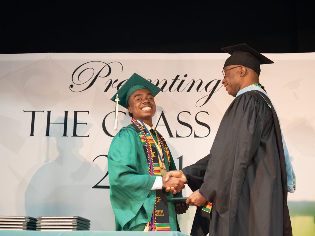 Graduate Receiving His Diploma in 2021