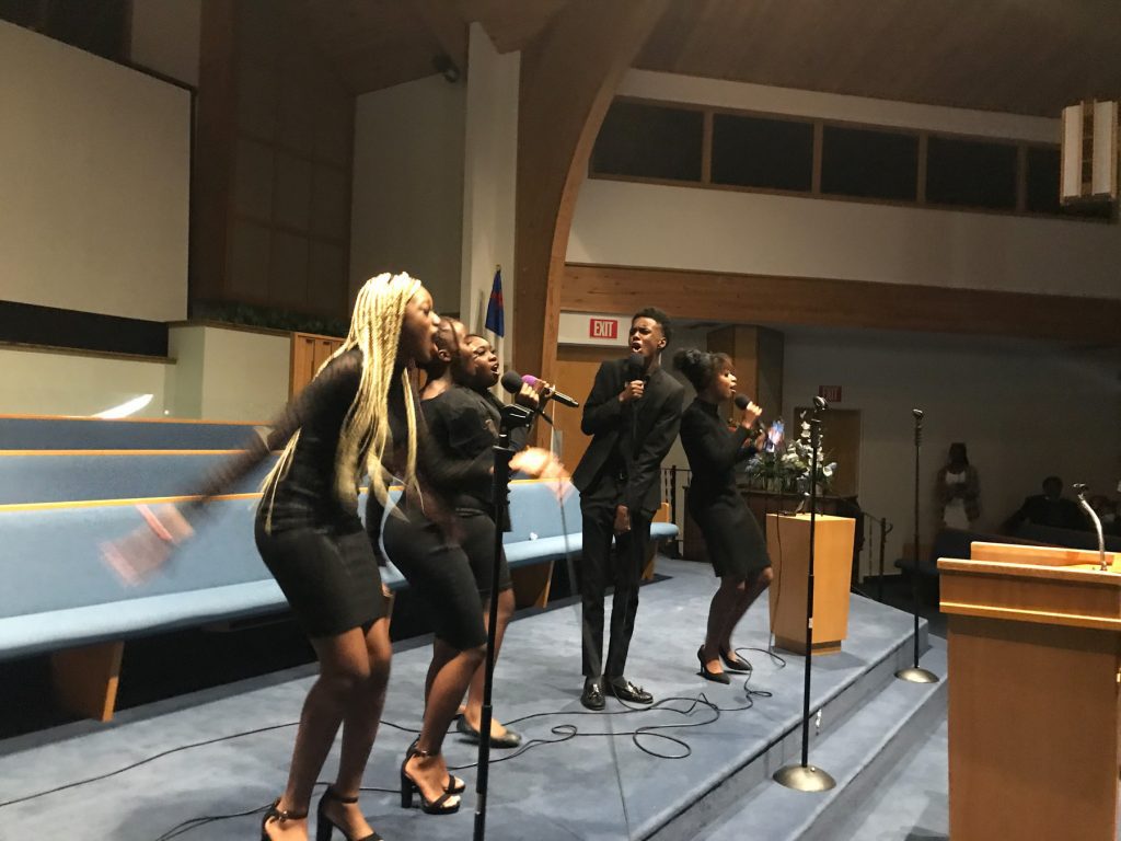 Spiritual Church Service with Teenagers Singing on Stage